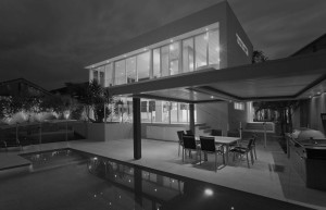 modern home with pool black and white