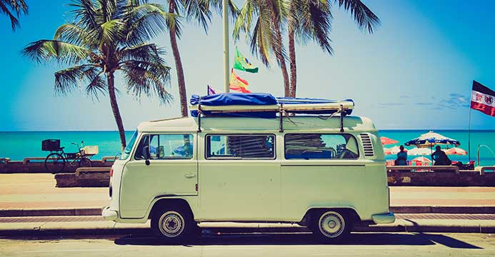 Green VW Bus packed for vacation